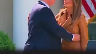 A Hot Mic Catches A Tender Moment Between Trump and Melania