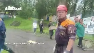 Rescuers at damaged kindergarten after quake off Russia's far east