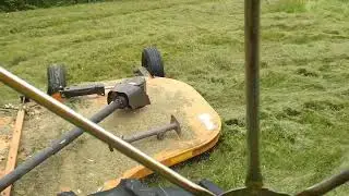 John Deere 4020 mowing invasive weeds with  Woods BW15.50