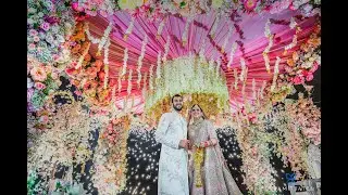 Couple Dancing at their Wedding ceremony with Fireworks in the background
