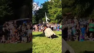 A knight in shining armor thundering across the field. Steel gleaming, banners #knight