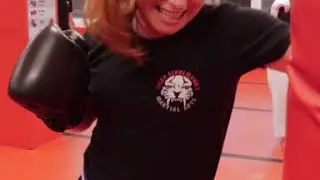 Adult Kickboxing Class working on the Heavy Bags in Stamford, Ct