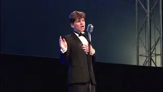 Teenage crooner Michael Lewis singing That's Life on stage at 2024 Inverness Games in Scotland