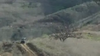 Bodies being recovered from helicopter wreckage