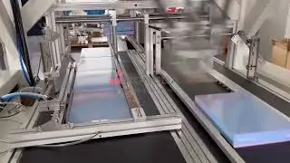 Rigid box lidding machine for capping lid on base box