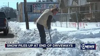 Man steps up to help neighbor, clearing snow from driveway