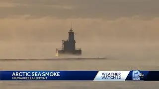 Arctic sea smoke pours off surface of Lake Michigan