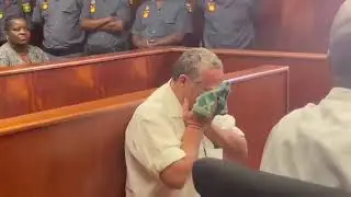 Watch: Zachariah Olivier, a pig farmer charged with the gruesome murders of two women, reportedly br