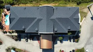 Roof Replacement at Holiday Inn Express in Winnie, TX | CertainTeed Landmark Moire Black