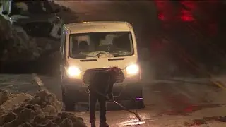 Water main break floods Roxborough roadway