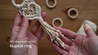 DIY macrame napkin ring in the shape of a heart.