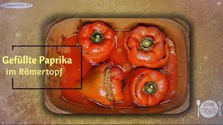 Gefüllte Paprika im Römertopf
