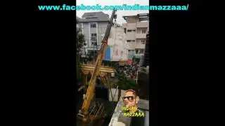 ganesh idol fall down from crane at Hyderabad
