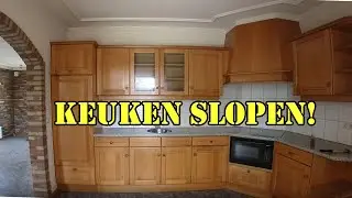 De oude keuken eruit slopen van ons nieuwe huis.