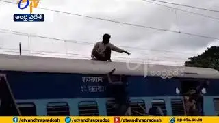 Watch Video | Passenger Trying to Touch Power Cable on Train | Vizianagaram