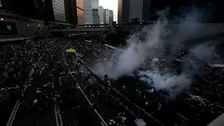 Tear gas fired at chaotic Hong Kong democracy protests