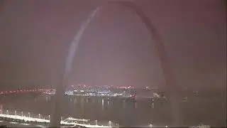 Storm blows snow past St. Louis arch