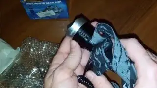 Налобный фонарь Securitylng и bluetooth наушники QCY QY7