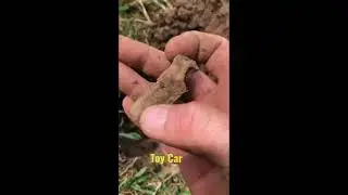 Metal Detecting: Old toy car. A toy the past.