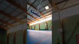 Man Performs Impressive Basketball Shots By Throwing Ball Through Multiple Hoops - 1199487