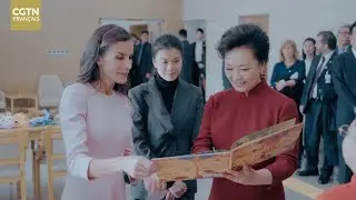 Peng Liyuan et la reine d'Espagne visitent un centre de services aux personnes handicap&eacute;es &agrave; Beijing
