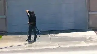 So funny Guy washing  driveway Today
