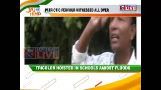Students hoist tricolour standing in knee-deep flood waters in Assam