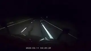Trucker's Eerie Dashcam Footage Captures Ghostly Figure on Deserted Highway