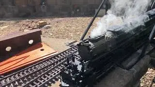 4004 slowly coming over the bridge. Note the puffs of smoke.