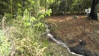opend up ditch ,drained flooded yard