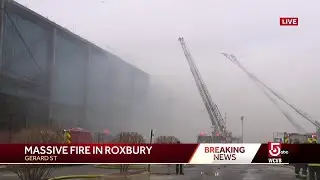 Multi-alarm fire breaks out at trash transfer station in Roxbury