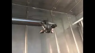 High pressure cleaning head operating inside a CMS automatic IBC washing station