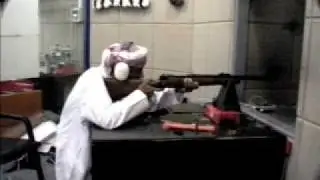 Arabs testing elephant rifles