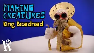 WISE OLD MAN made out of watch parts and other shiny stuffs
