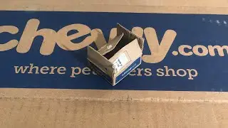 Artist creates a miniature shipping box by hand