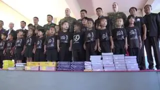 Marine Air Group 12 and the Royal Thai Army present books and other educational material