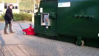 V-Move XL 1.5 kw dumpster mover tug moving Roll Off compactor | xerowaste.ca
