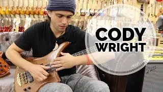 Cody Wright playing a Alembic Bass at Norman's Rare Guitars