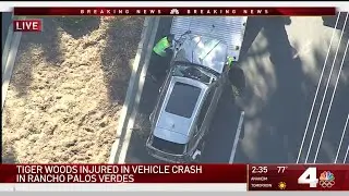Tow Truck Carts Away SUV From Tiger Woods Crash Site