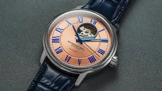 An Elegant Open Heart Dress Watch With a Salmon Dial - The Raymond Weil Maestro