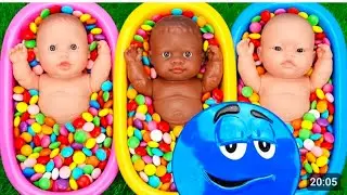 Full of 3 rainbow bath tubes candy with M andMs