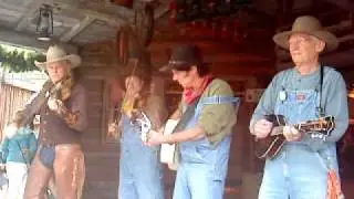 Billiy's and Farley on the porch in fronteerland