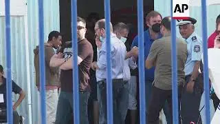 Migrant boat sinking survivors treated at Greek port