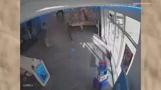 Lawrence cell phone store robbery surveillance video