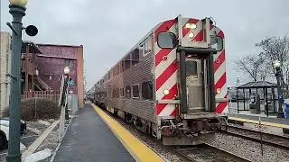 Metra cab-car 8511 east with SD70MACH 509 at Elgin, Illinois on Christmas Eve 2025