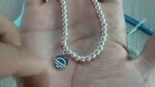 Help! is this tiffany bracelet real?  Red heart bracelet 2018 new collection