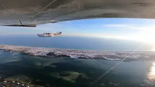 Bonanza in Close Formation along the Emerald Coast in Florida