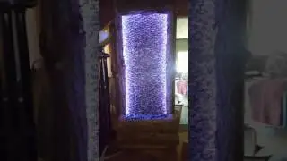 Water Wall I built. DIY. Floor to ceiling Wall Fountain. Nearly 8 feet tall. Live edge wood surround