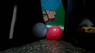 Cat playing with balloon and broken it mobile screen