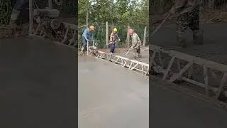 Leveling Wet Concrete for Roads &ndash; Construction Team Workflow